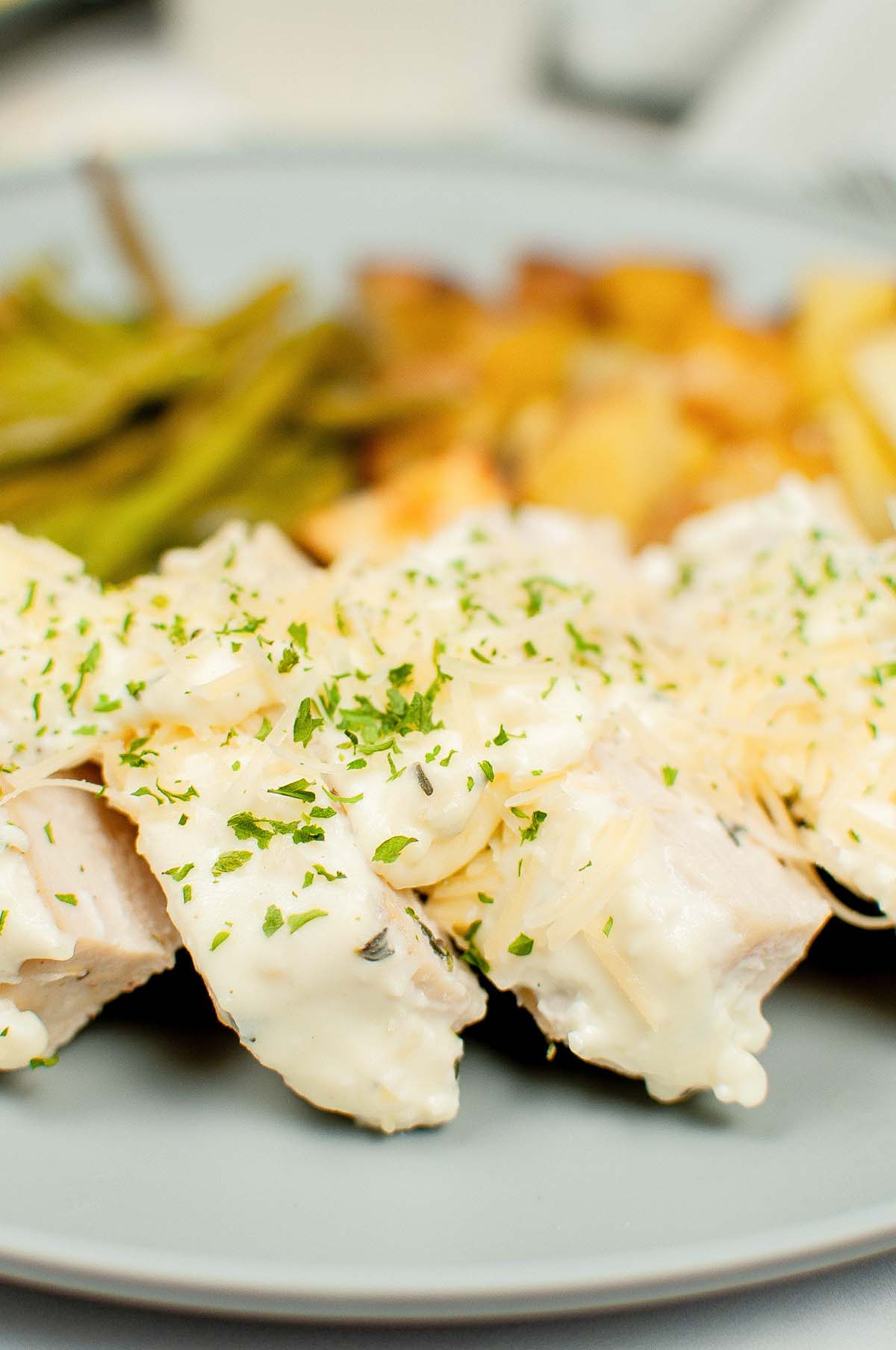 close up garlic herb chicken sliced.
