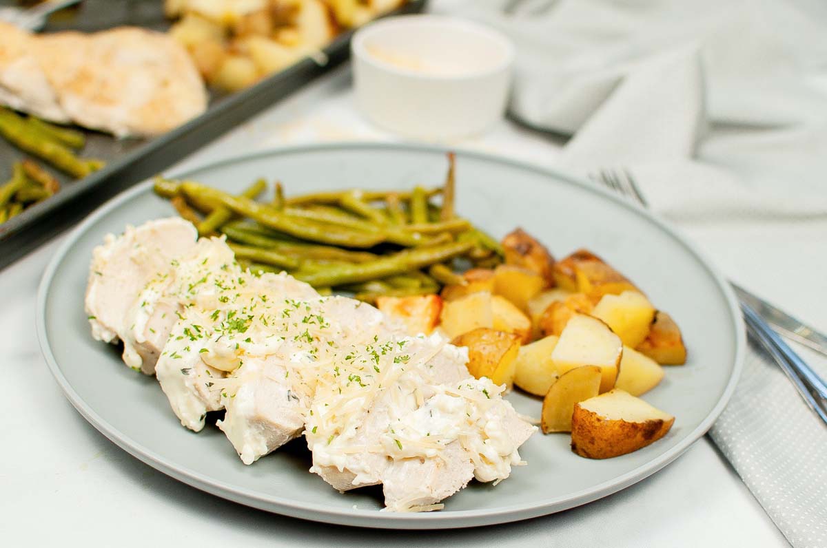 one pan chicken and potatoes plated.
