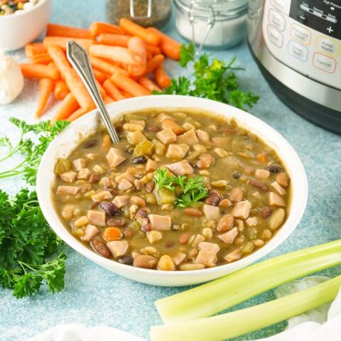15 bean soup in a bowl with spoon.