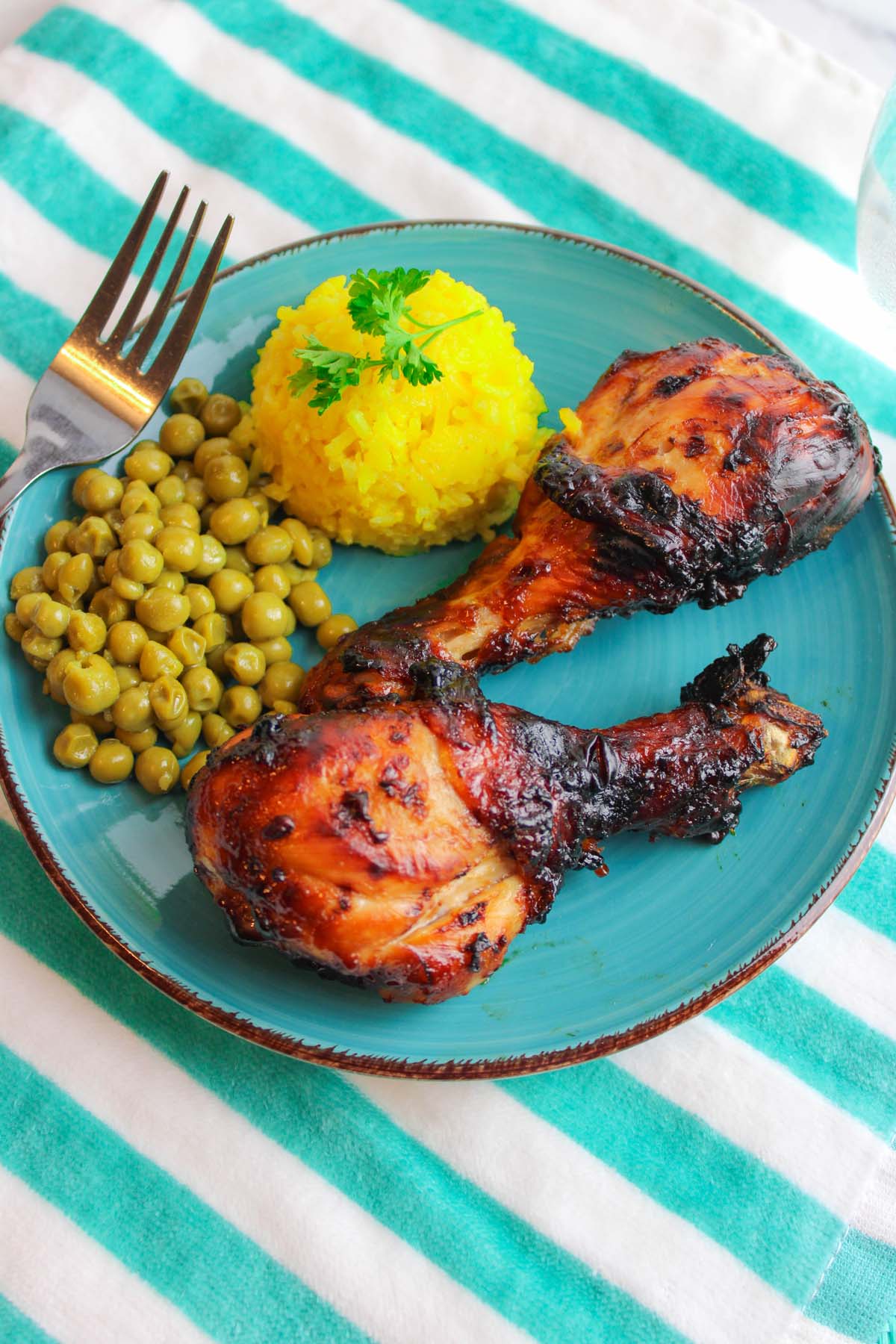 air fryer chicken legs on a plate.
