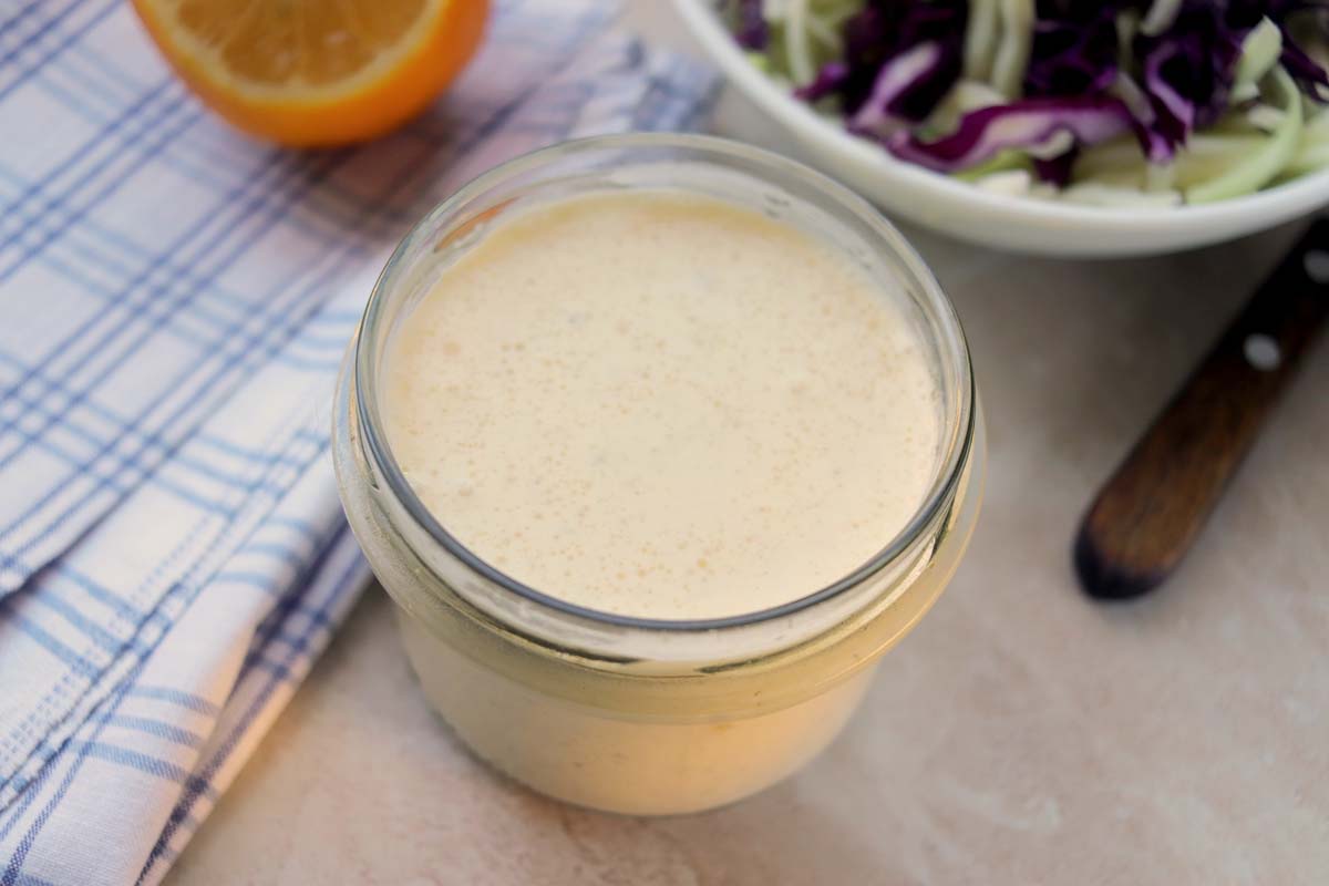 creamy citrus vinaigrette in a glass jar.