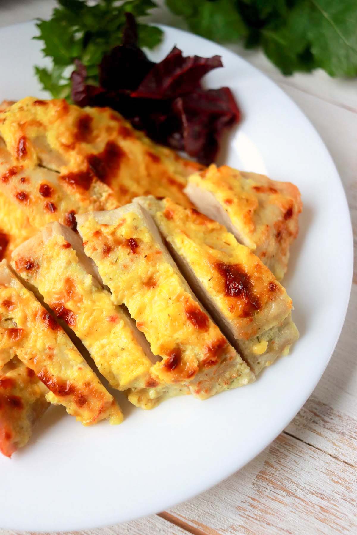 Sliced chicken on a plate.