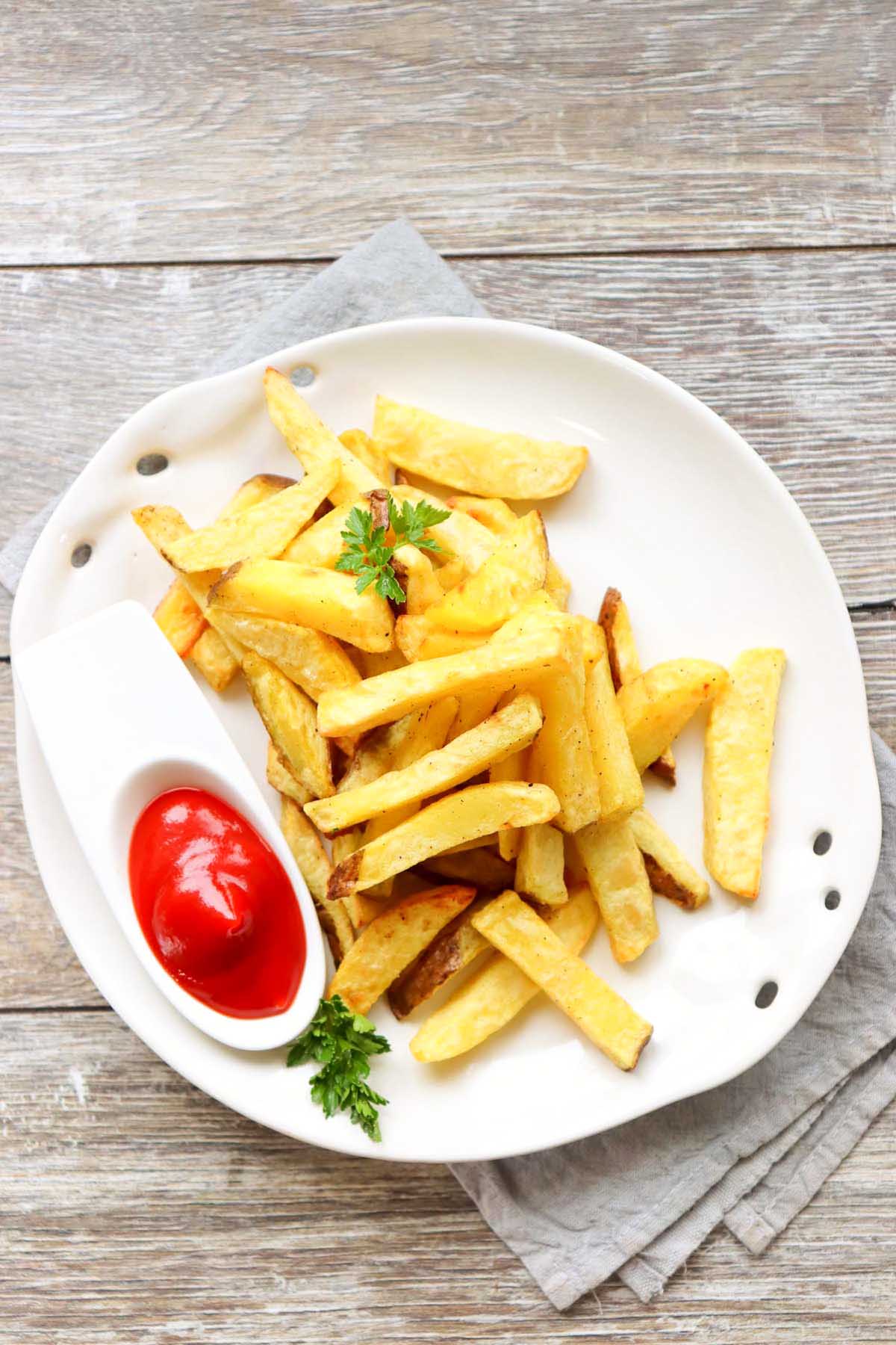 Fries on a white plate.