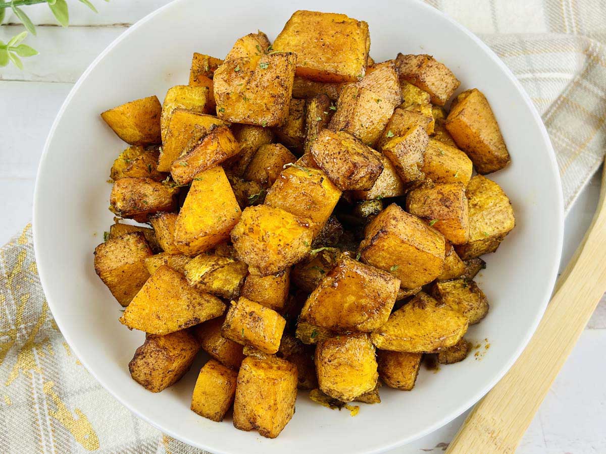 Butternut squash cubes in a bowl.