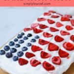 american flag cake with fruit pin.