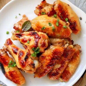 Thumbnail of broiled chicken wings.