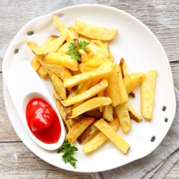 top view fries on a plate.