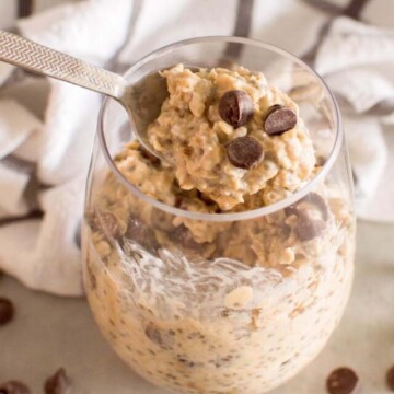 overnight oats scooped on a spoon.