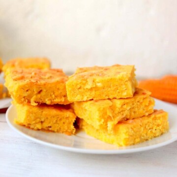 side view of cornbread on a plate.