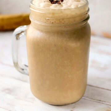 side view of a protein shake in a jar.