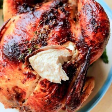 Chicken with a slice carved out.