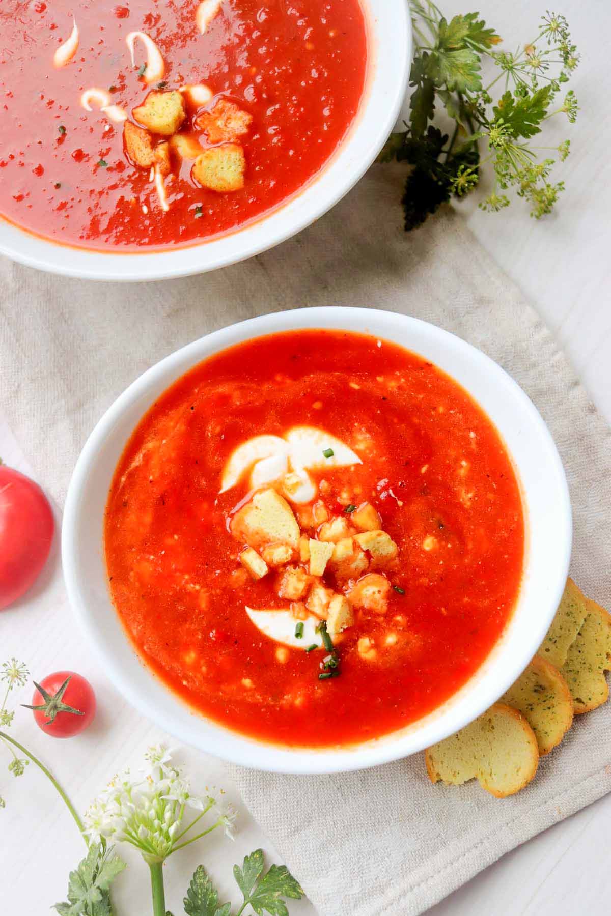 Tomato soup topped with croutons.