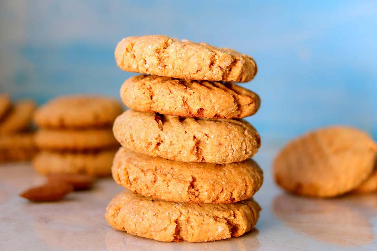 Five cookies stacked on a table.