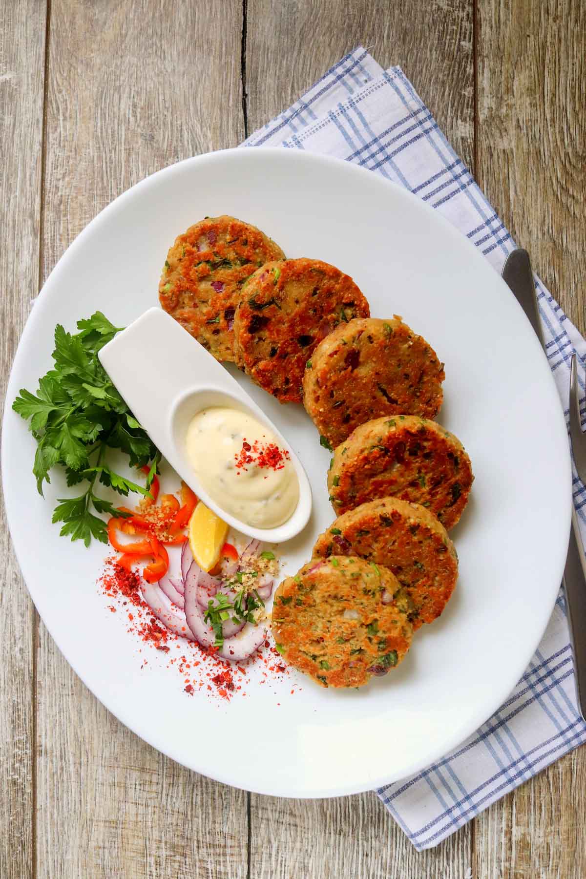 top view of tuna patties on a plate.