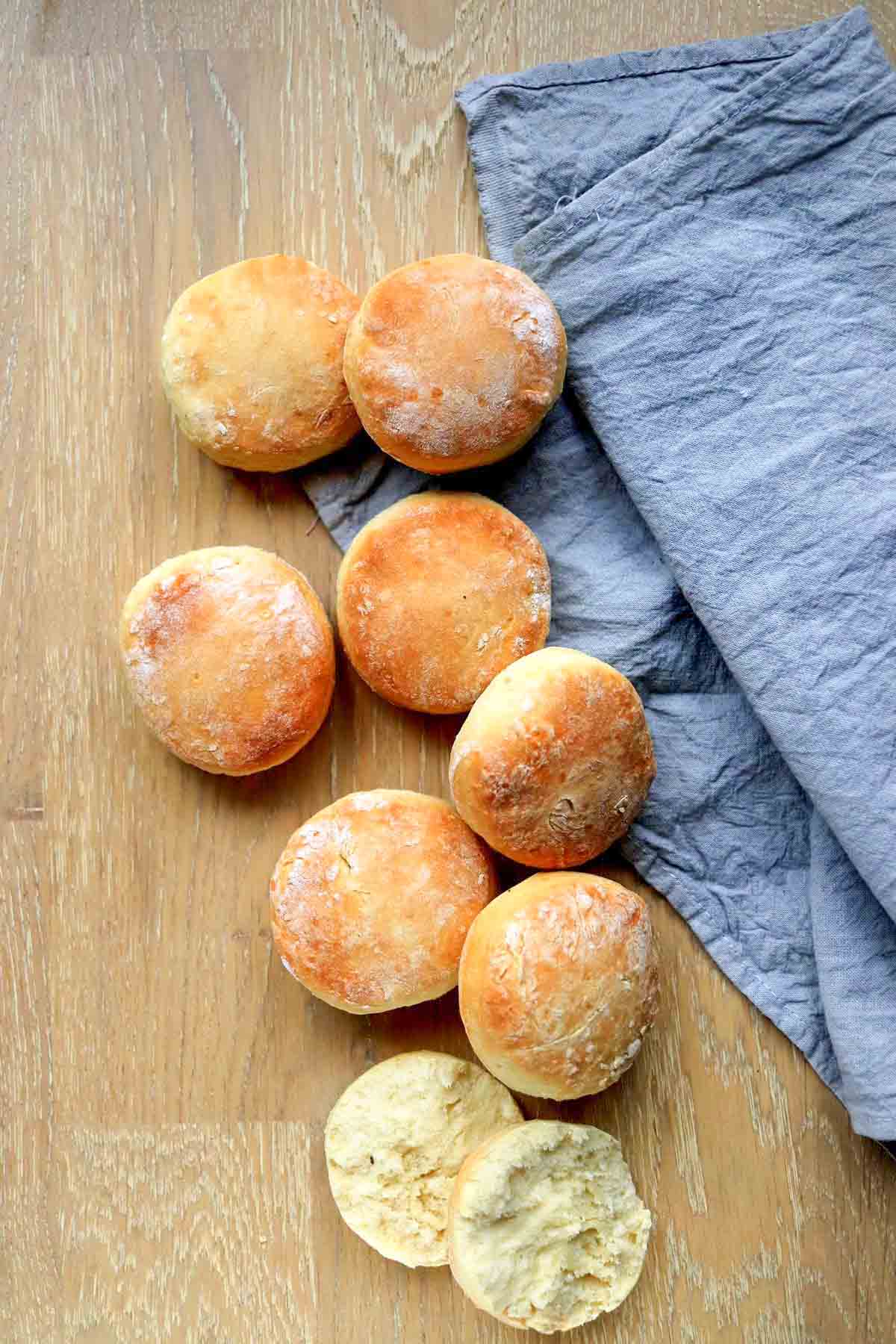 Biscuits on a table next to a blue towel.