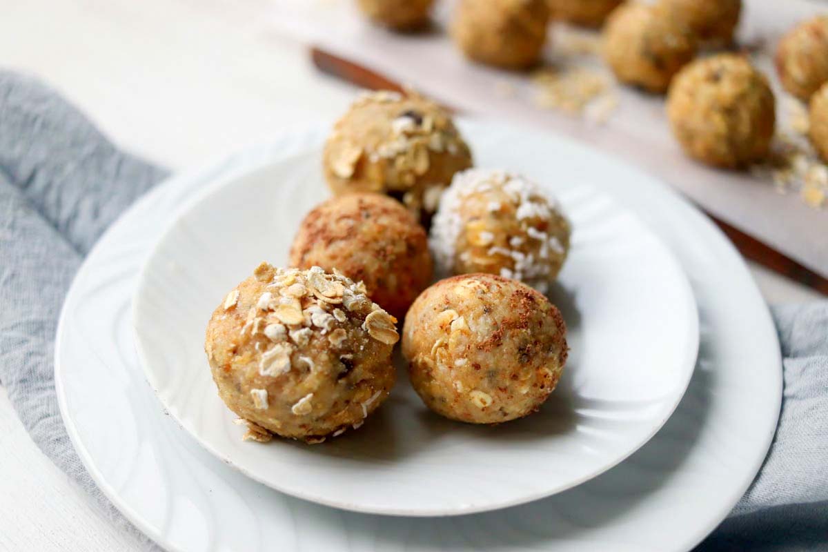 Oatmeal bites on a white plate.