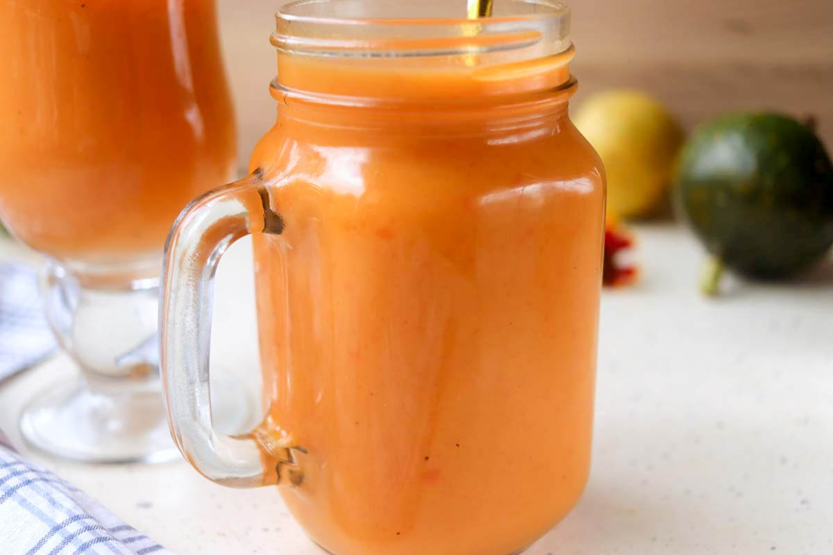 close up view of pumpkin smoothie in a jar.