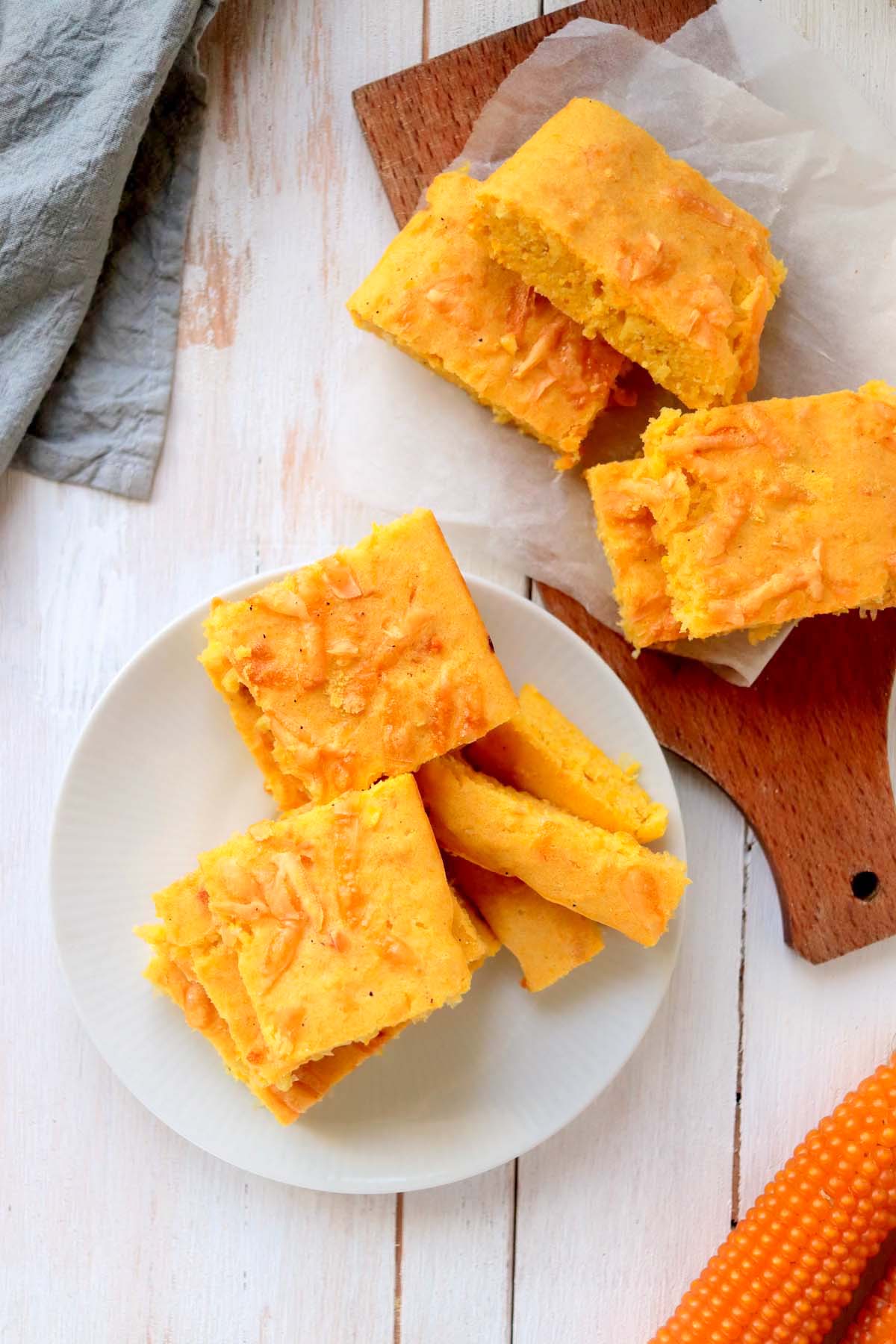 Sliced cornbread on a table.