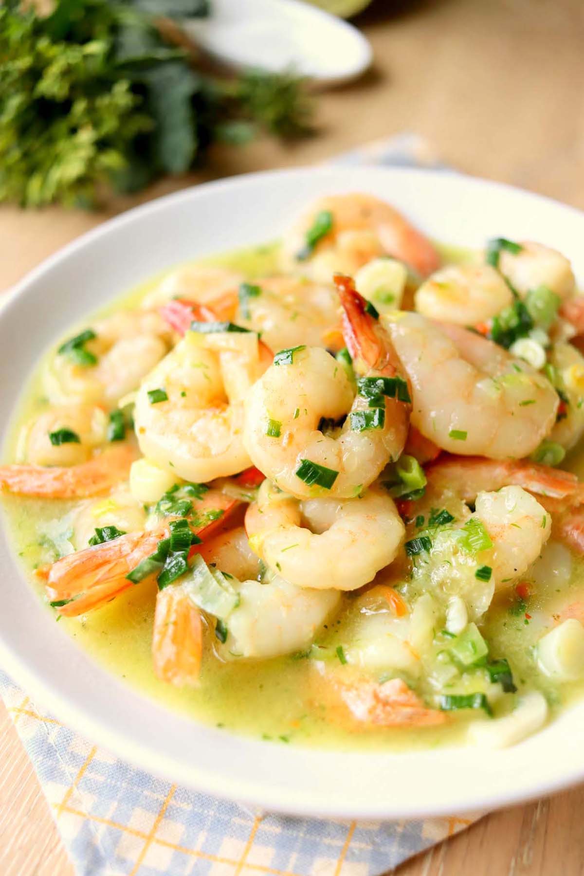 Shrimp scampi on a white plate.