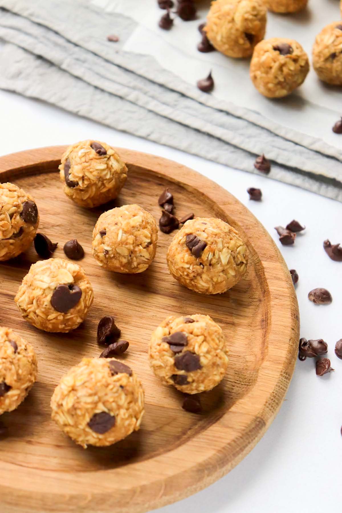 Energy balls on a wood board.