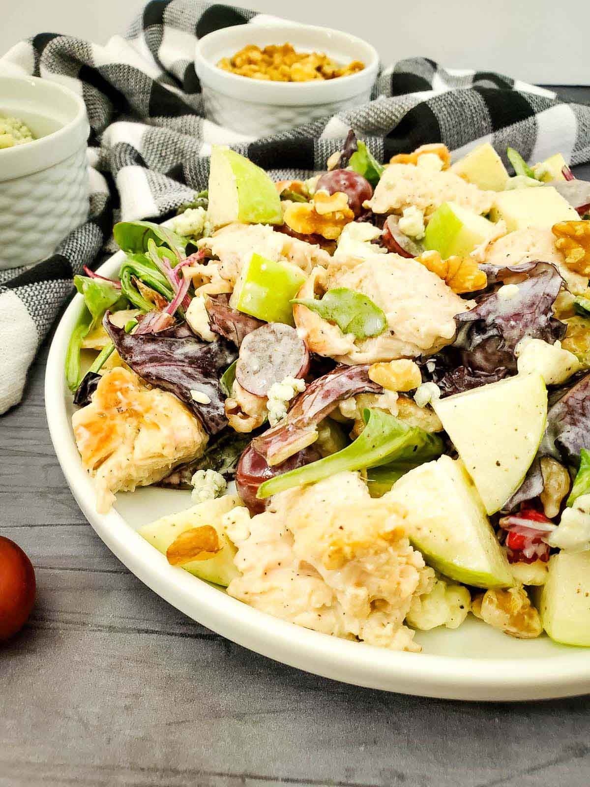 Chicken salad on a white plate.