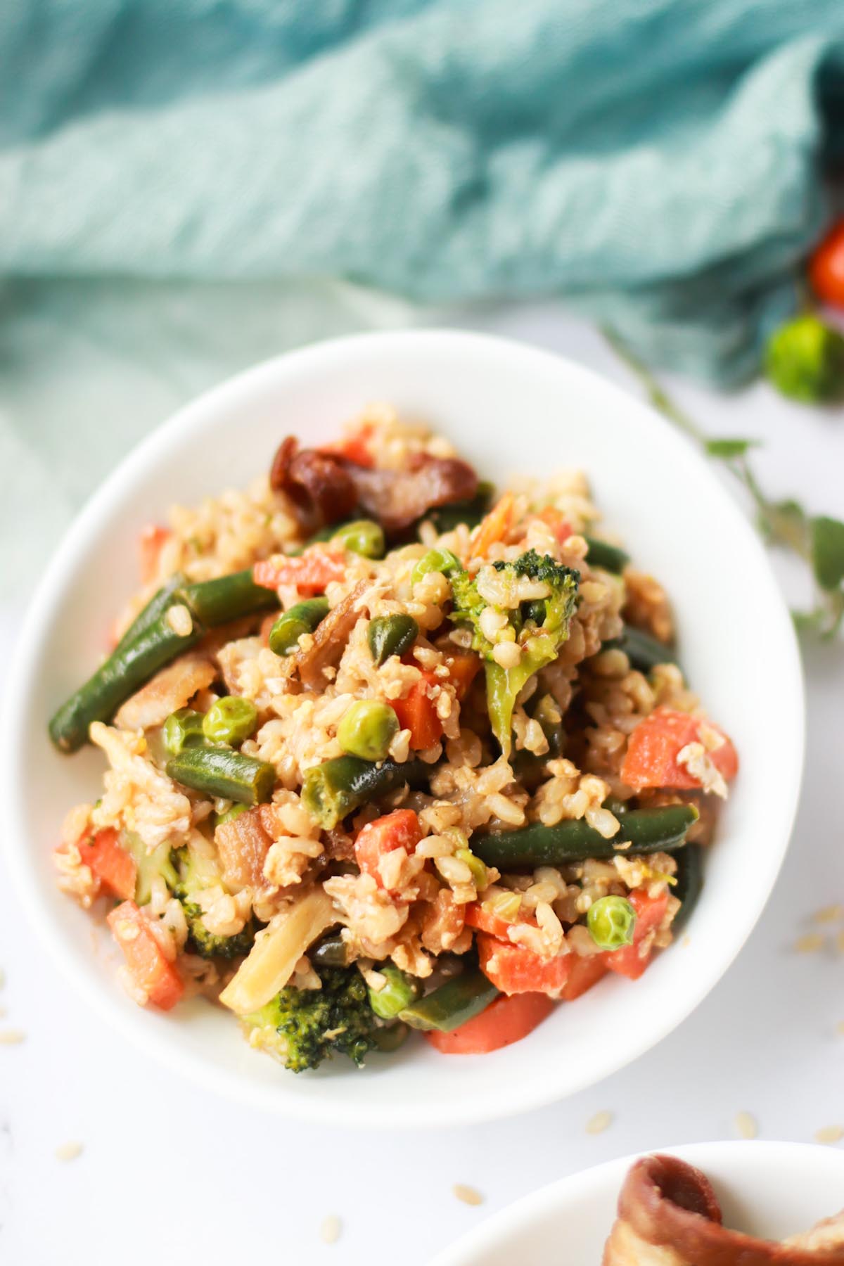 Fried rice in a white bowl.