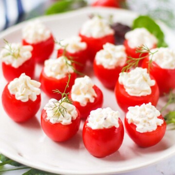 Thumbnail of cream cheese stuffed cherry tomatoes.