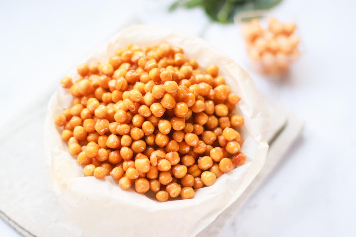 Chickpeas in a bowl with parchment paper.