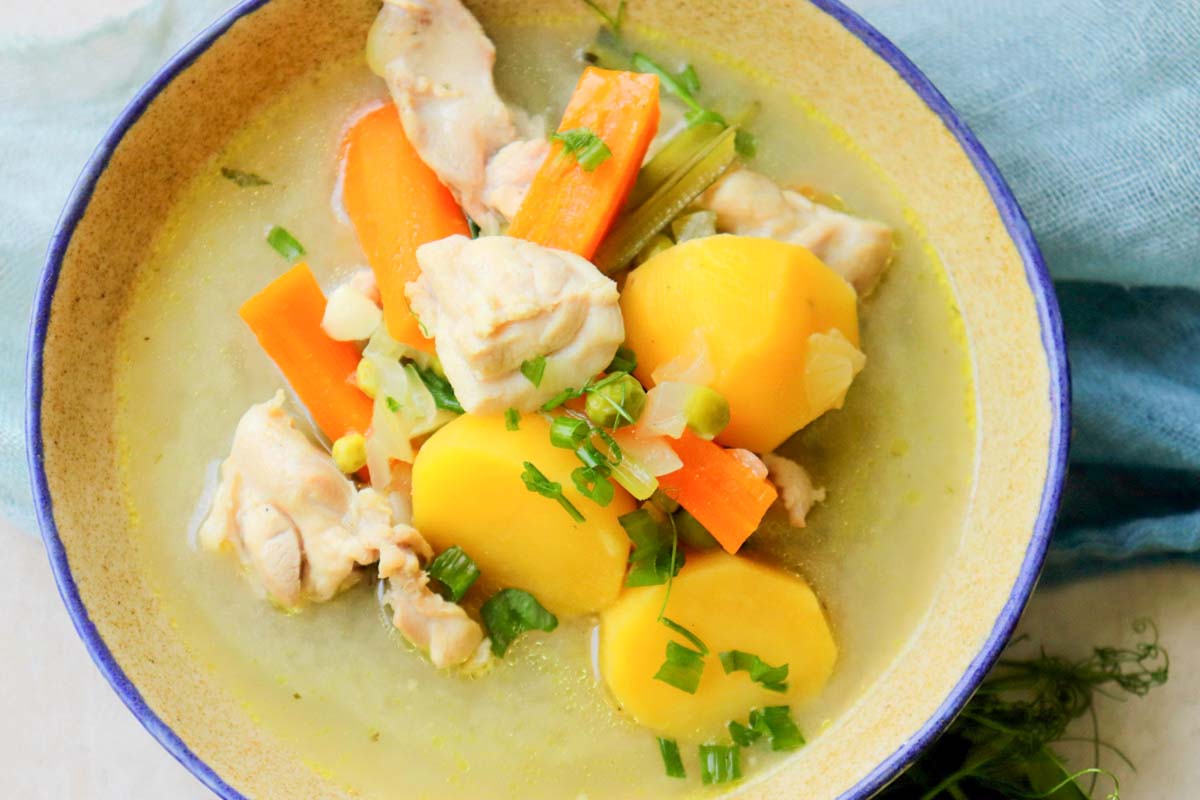 close up view of chicken stew in a bowl.