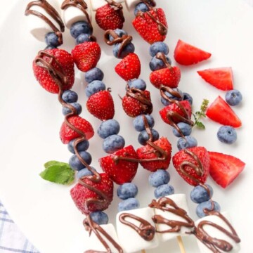 fruit kabobs drizzled with chocolate.