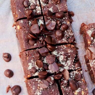 top view of sliced cookie bars on parchment paper.