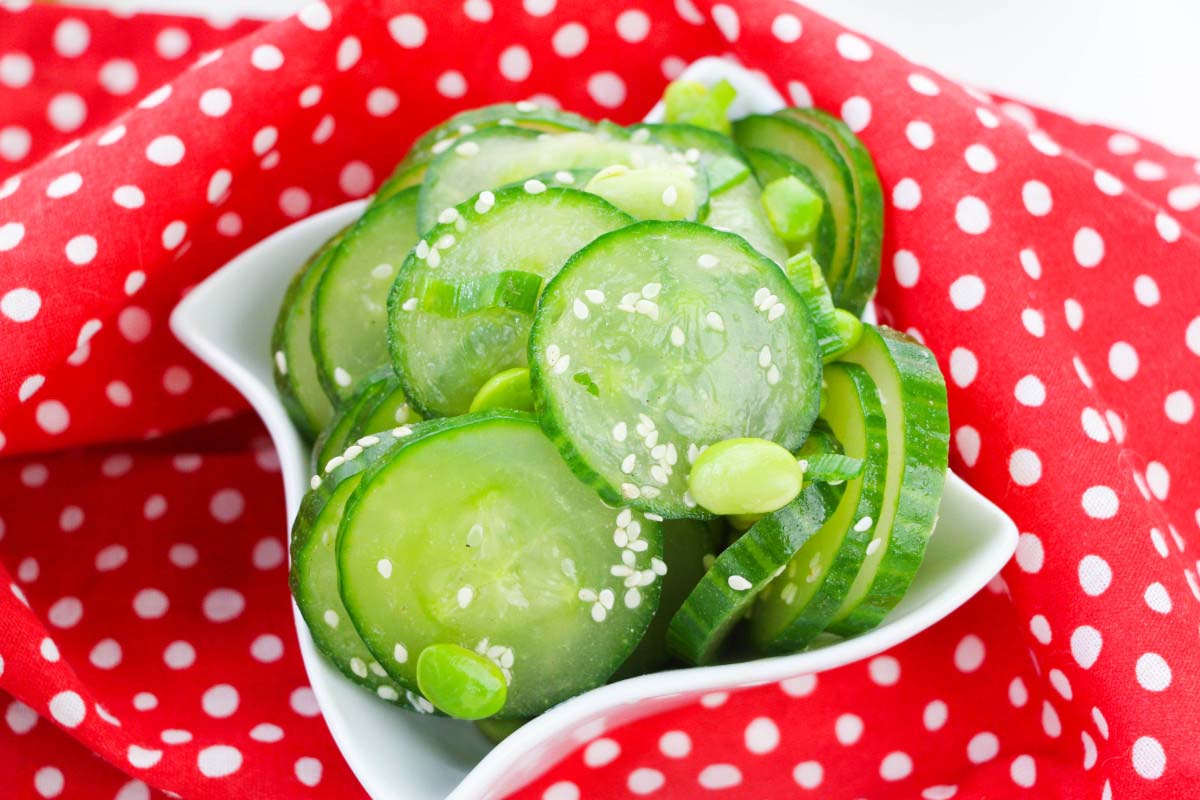 close up view of cucumber salad in a bowl.
