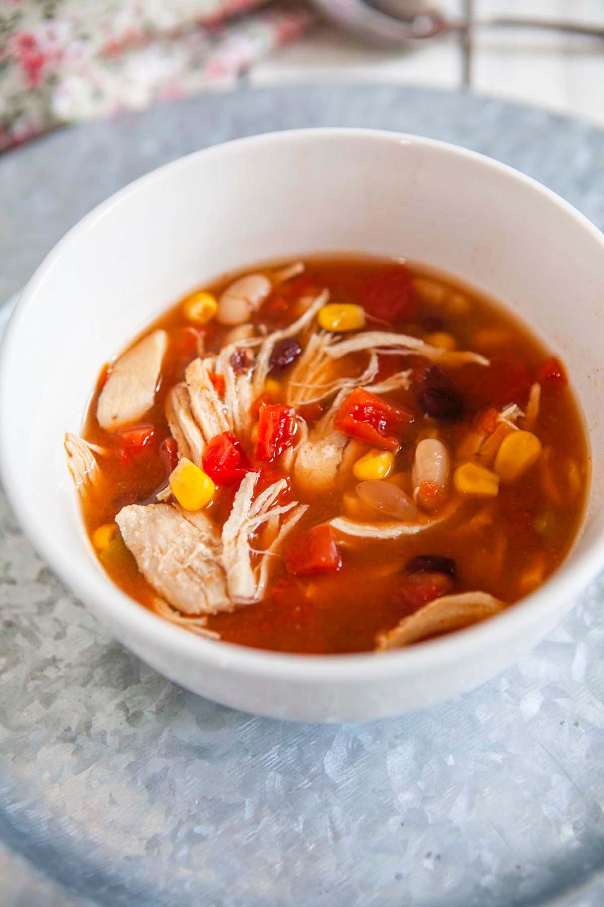 Taco soup in a white bowl.