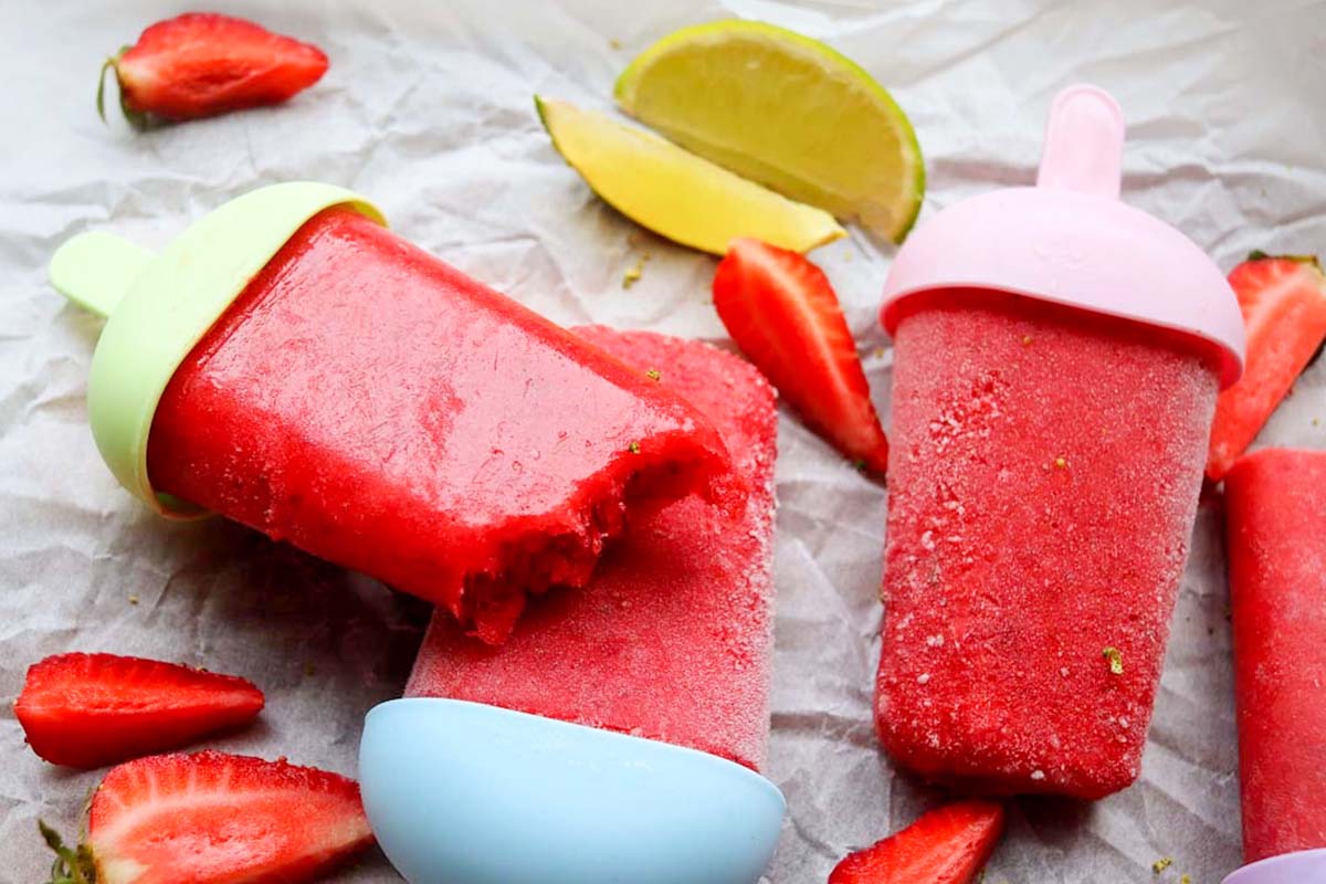 strawberry popsicle with a bite taken out.