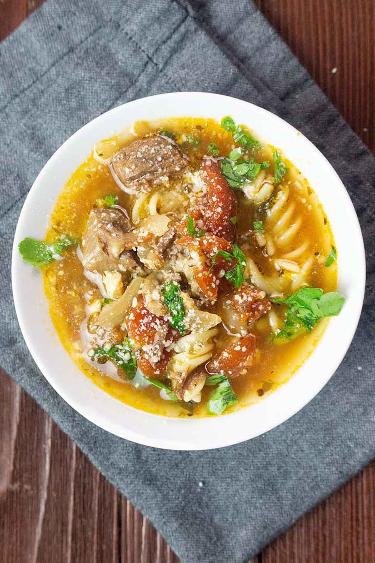Pasta beef stew in a bowl.