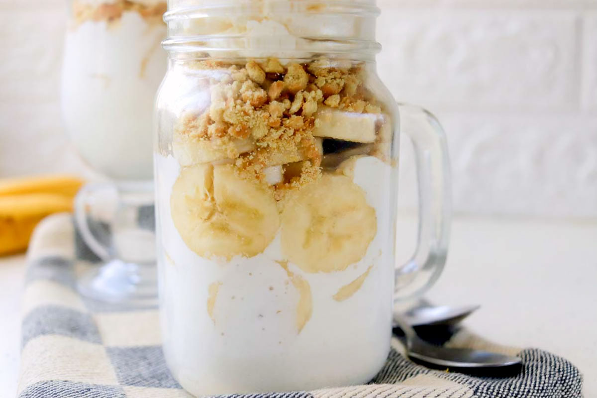 side view of banana cream pie in a jar.