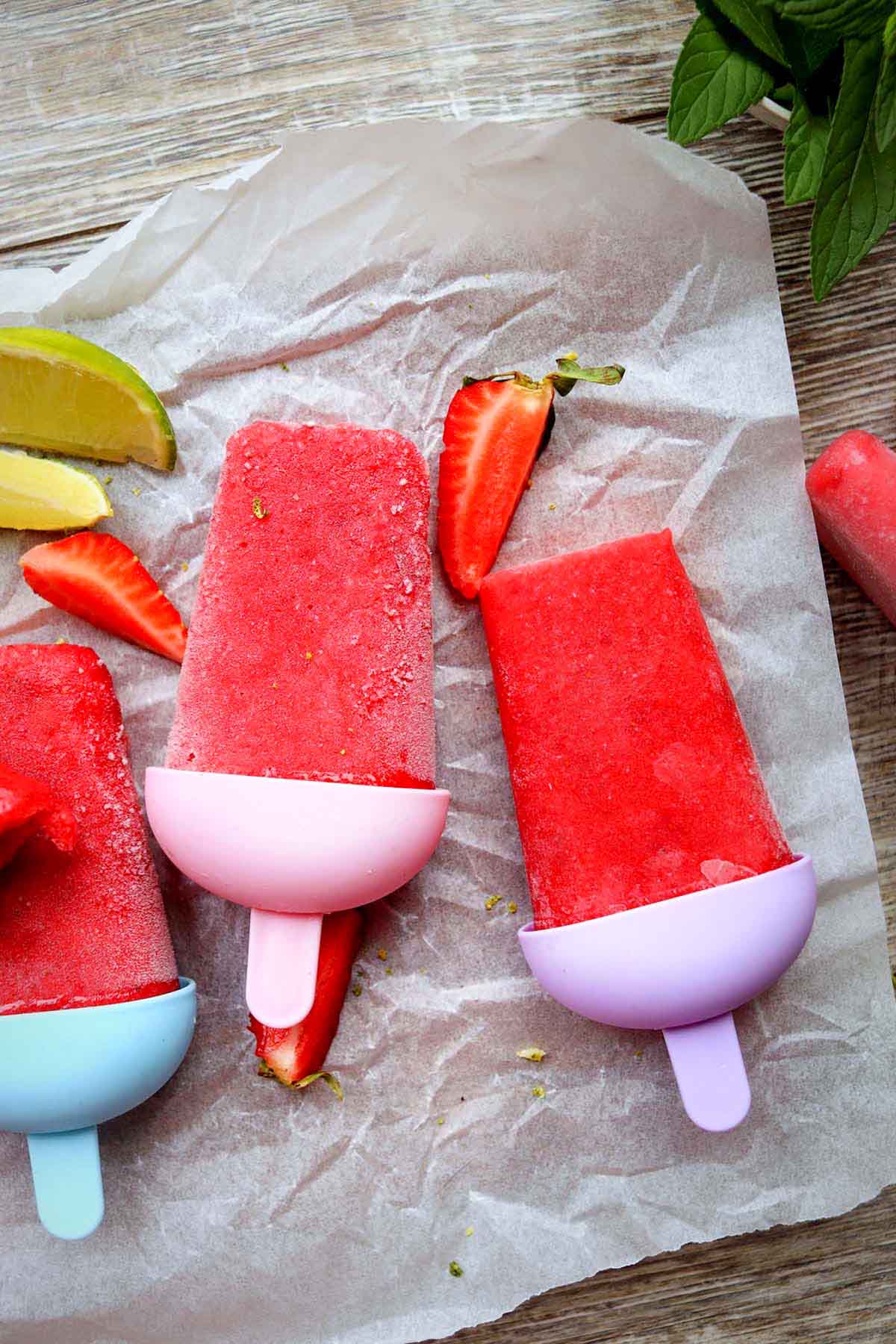 top view of popsicles on parchment paper.