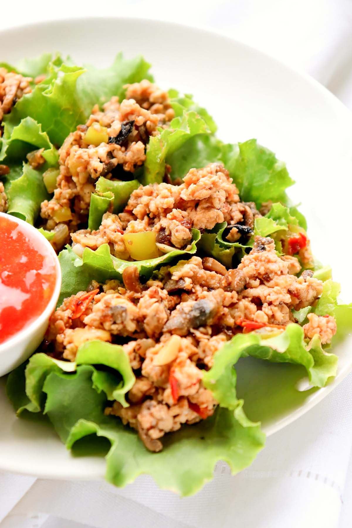 Lettuce wraps on a plate.