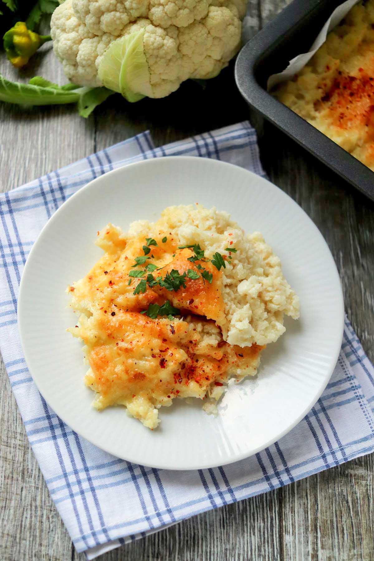 Cauliflower on a white plate.