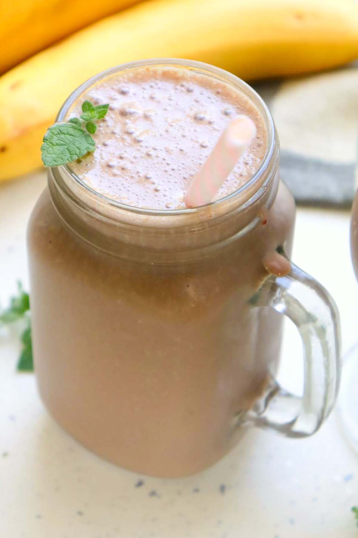 Chocolate milkshake in a glass jar.