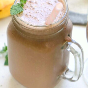 banana almond butter chocolate milkshake in a jar.