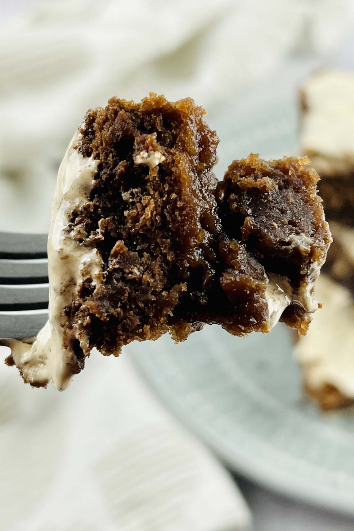 Piece of brownie on a fork.