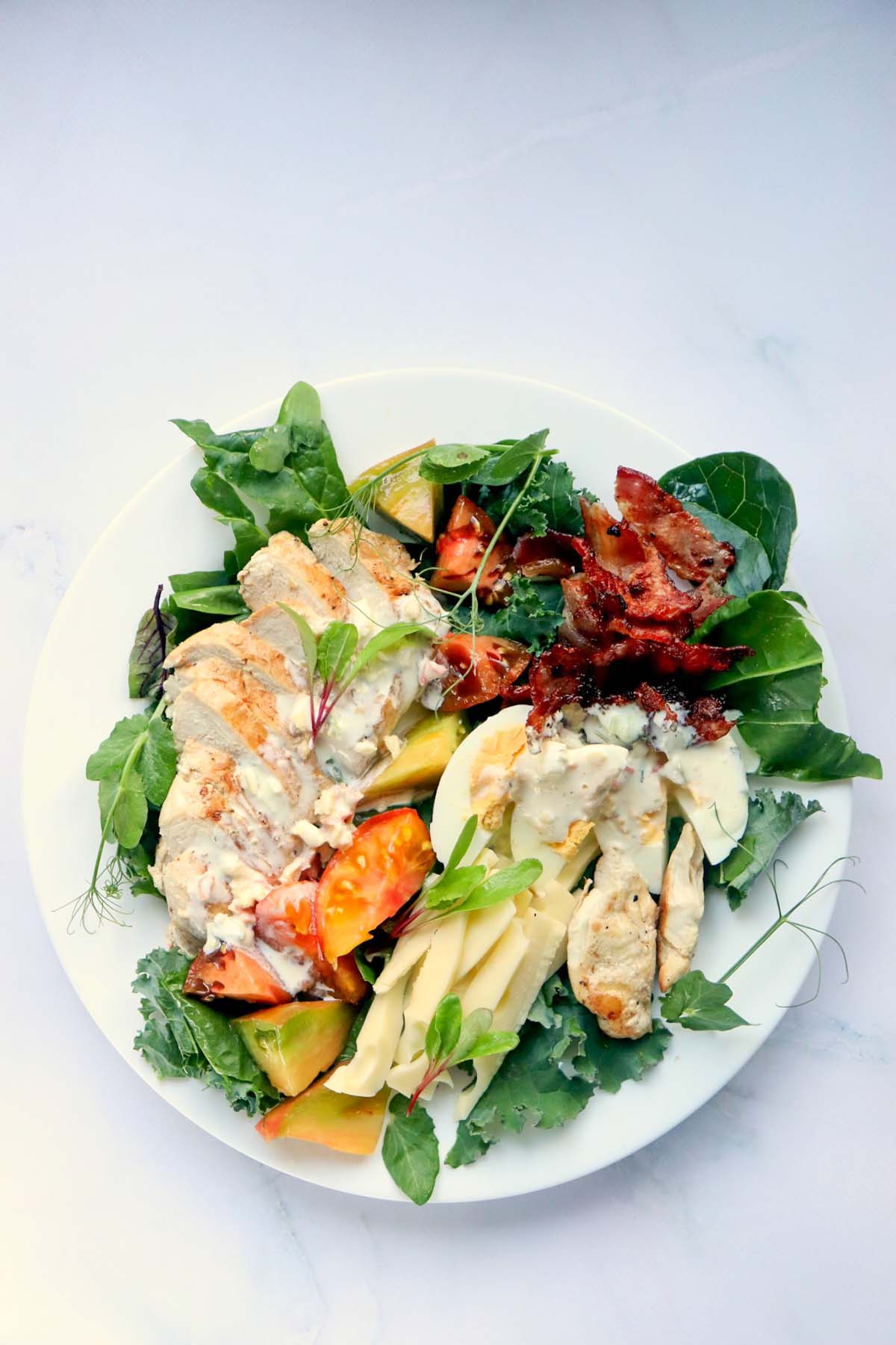 BLT salad on a white plate.