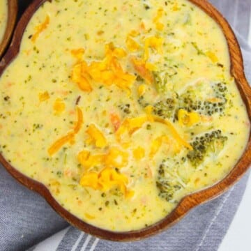 close up view of creamy broccoli cheddar soup.