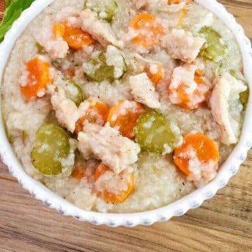 top view of turkey rice soup in a bowl.