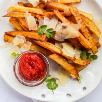 homemade truffle fries on a plate.