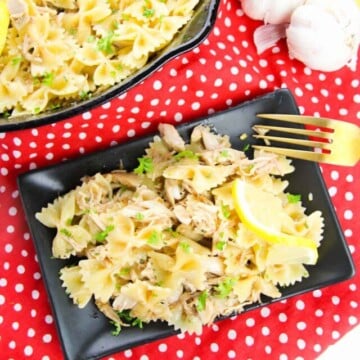 top view pasta with lemon on a plate.