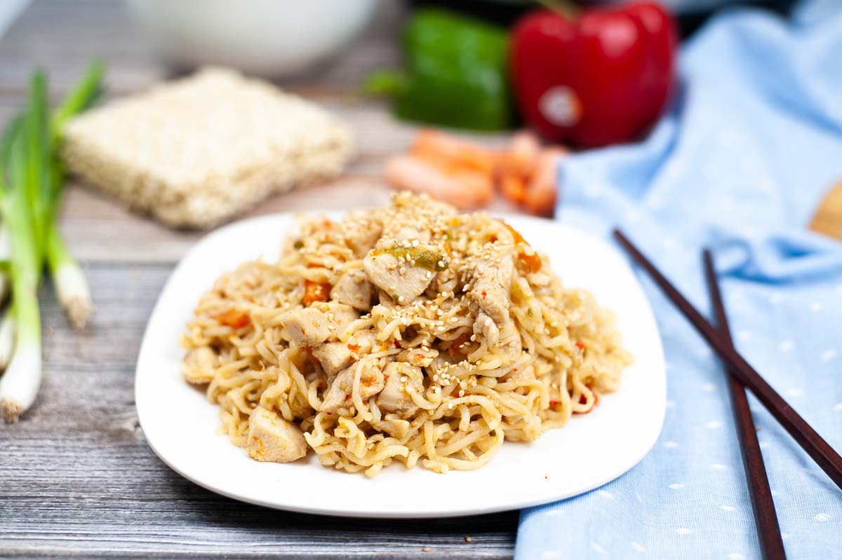 Ramen noodles and chicken on a plate.