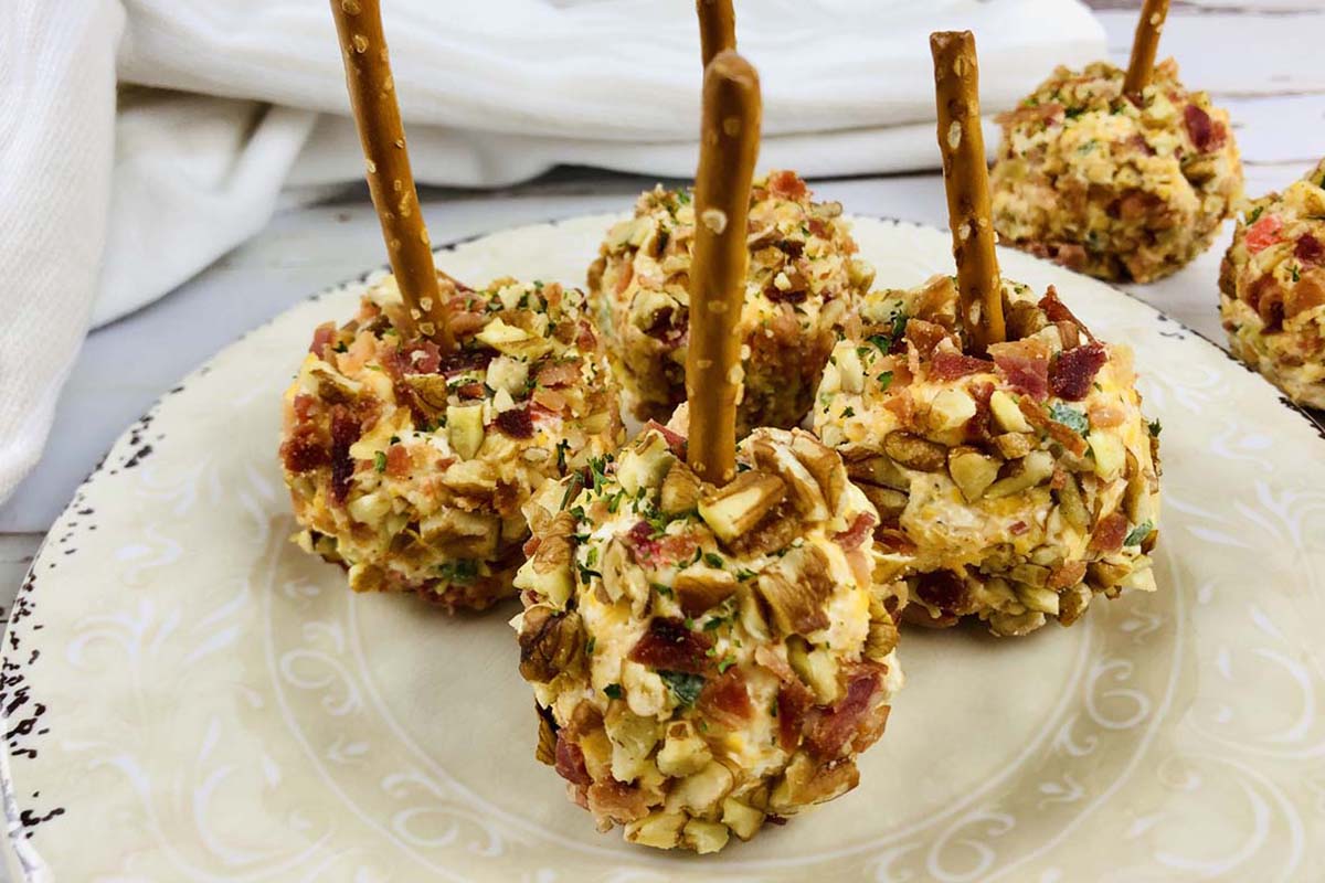 Individual cheese balls on a plate.