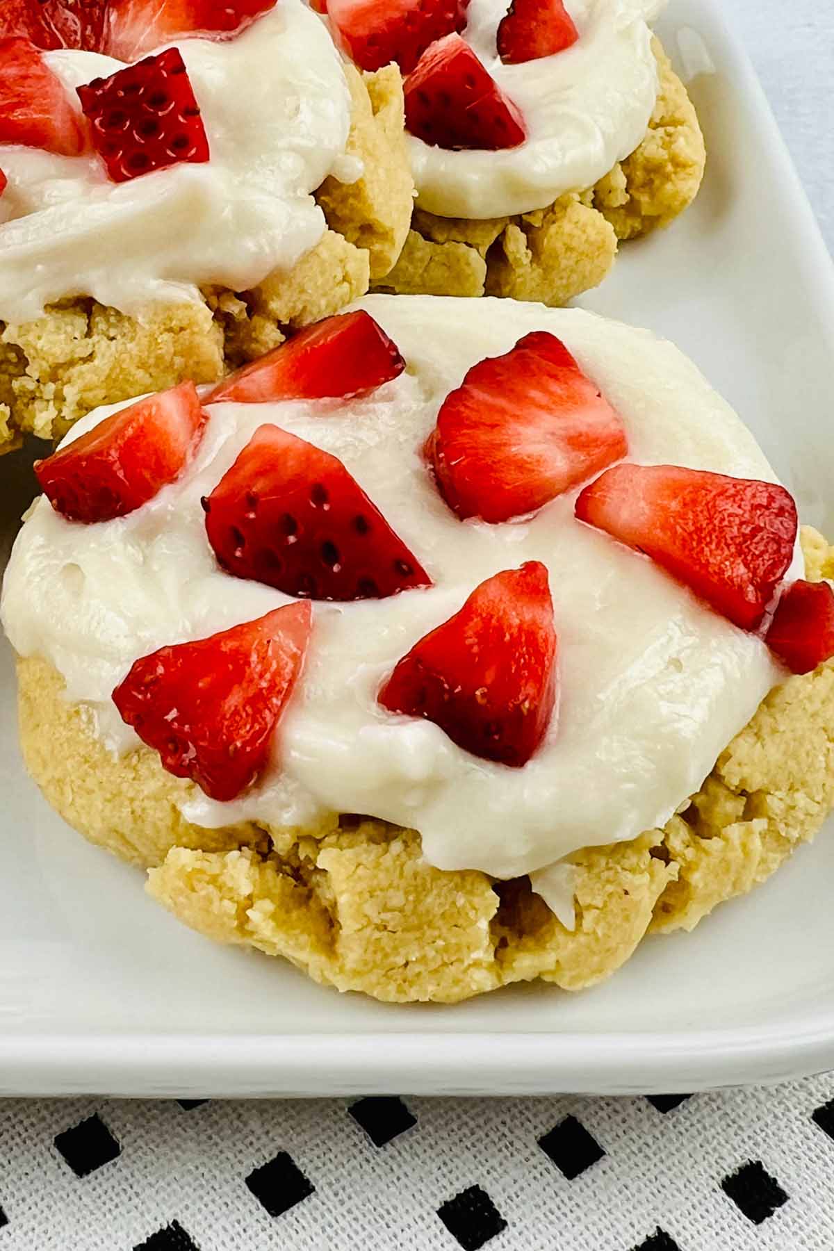Sugar cookie topped with strawberries.